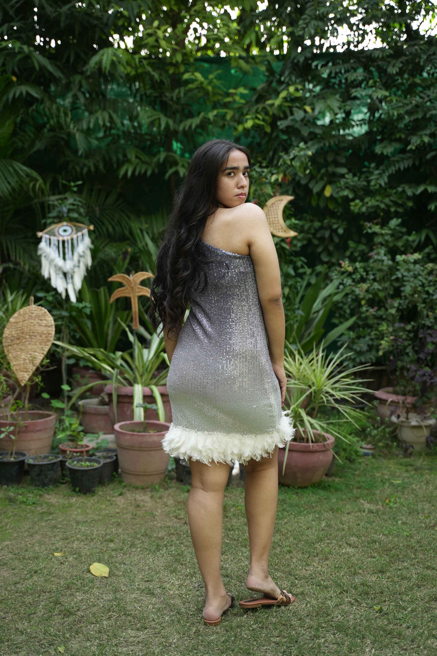 Blue sequin dress with feather